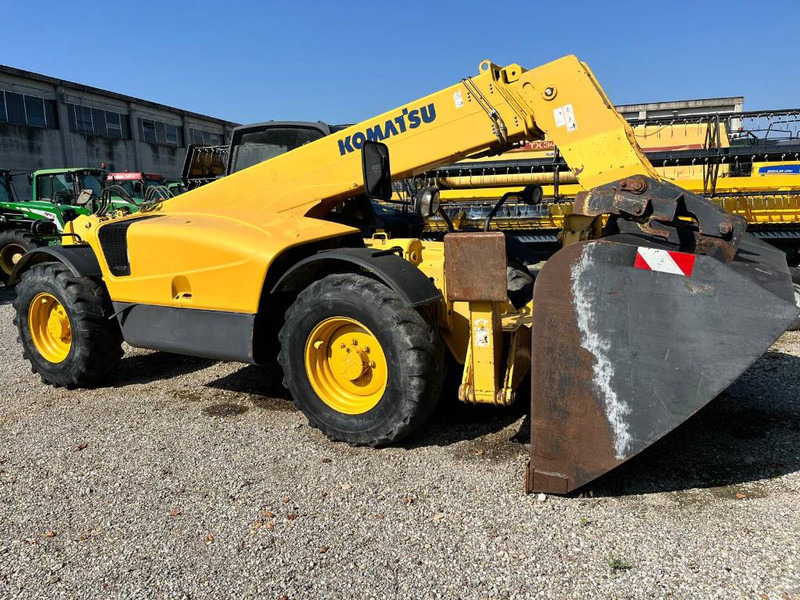 Komatsu WH 713 - Ekskavator teleskopik: foto 1 Komatsu WH 713 - Ekskavator teleskopik: foto 1