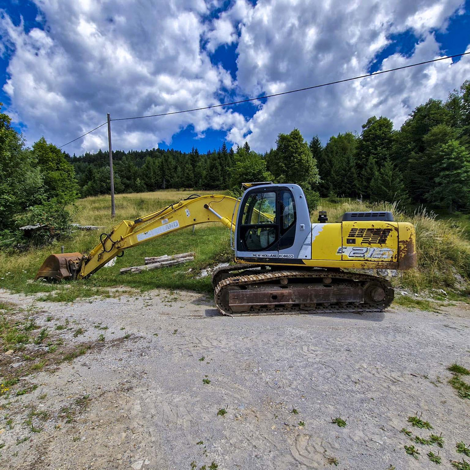 New Holland Kobelco E215 - Ekskavator me zinxhirë: foto 1 New Holland Kobelco E215 - Ekskavator me zinxhirë: foto 1