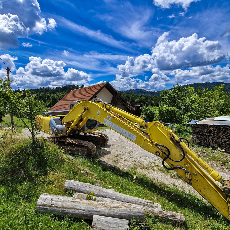 New Holland Kobelco E215 - Ekskavator me zinxhirë: foto 3 New Holland Kobelco E215 - Ekskavator me zinxhirë: foto 3