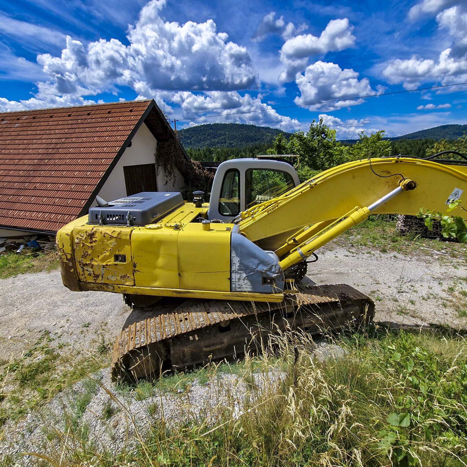 New Holland Kobelco E215 - Ekskavator me zinxhirë: foto 4 New Holland Kobelco E215 - Ekskavator me zinxhirë: foto 4