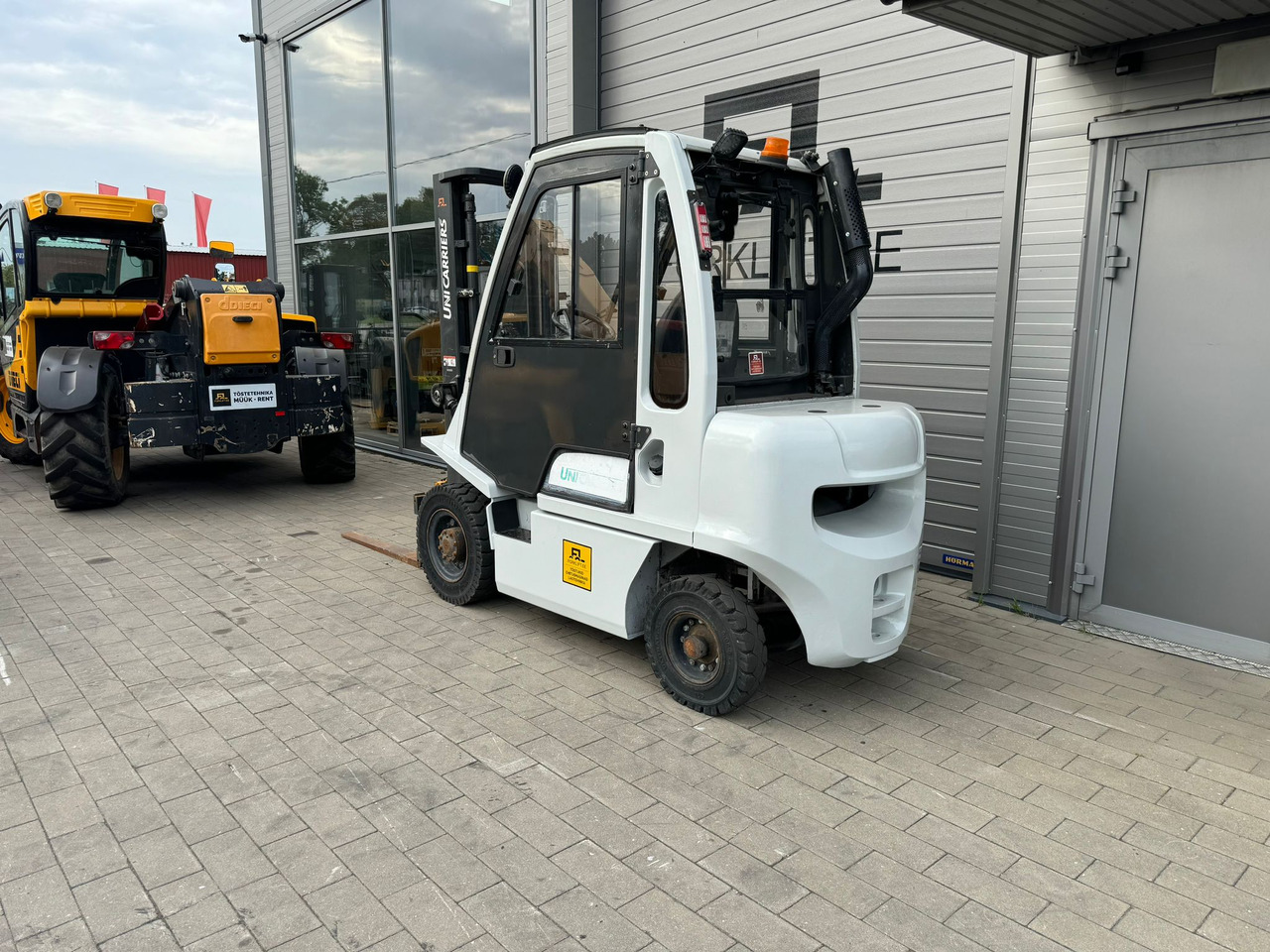 Unicarriers Y1D2A25Q - Pirun më naftë: foto 3 Unicarriers Y1D2A25Q - Pirun më naftë: foto 3