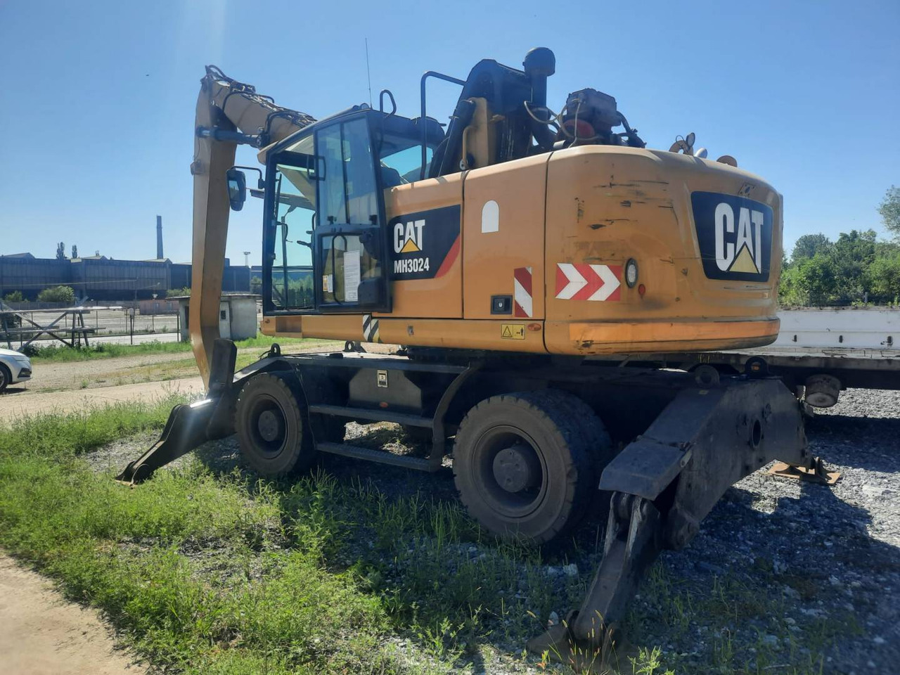 CAT MH3024-06 - Ekskavator me goma: foto 1 CAT MH3024-06 - Ekskavator me goma: foto 1