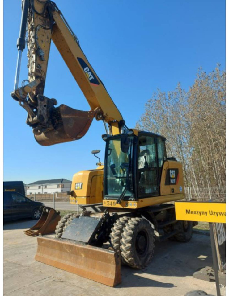 CAT M315F - Ekskavator me goma: foto 1 CAT M315F - Ekskavator me goma: foto 1