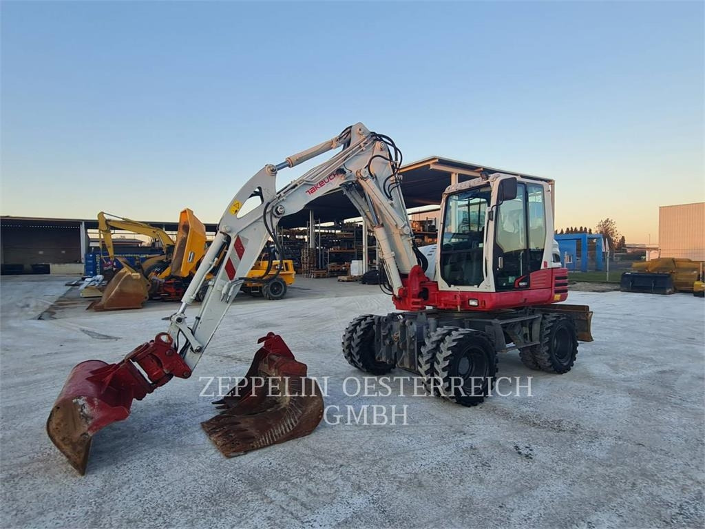 Takeuchi TB295W - Ekskavator me zinxhirë: foto 1 Takeuchi TB295W - Ekskavator me zinxhirë: foto 1