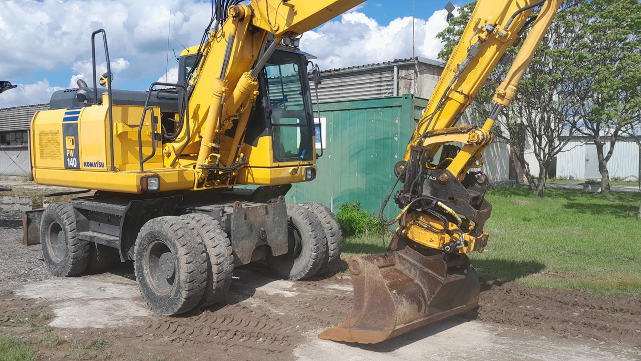 KOMATSU PW 140-7 - Ekskavator me goma: foto 4 KOMATSU PW 140-7 - Ekskavator me goma: foto 4