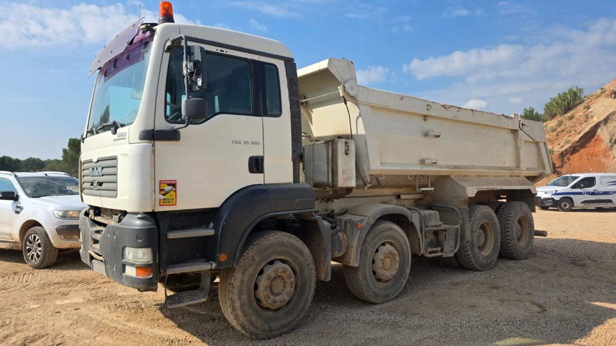 MAN TGA 35.360 - Kamion vetëshkarkues: foto 1 MAN TGA 35.360 - Kamion vetëshkarkues: foto 1