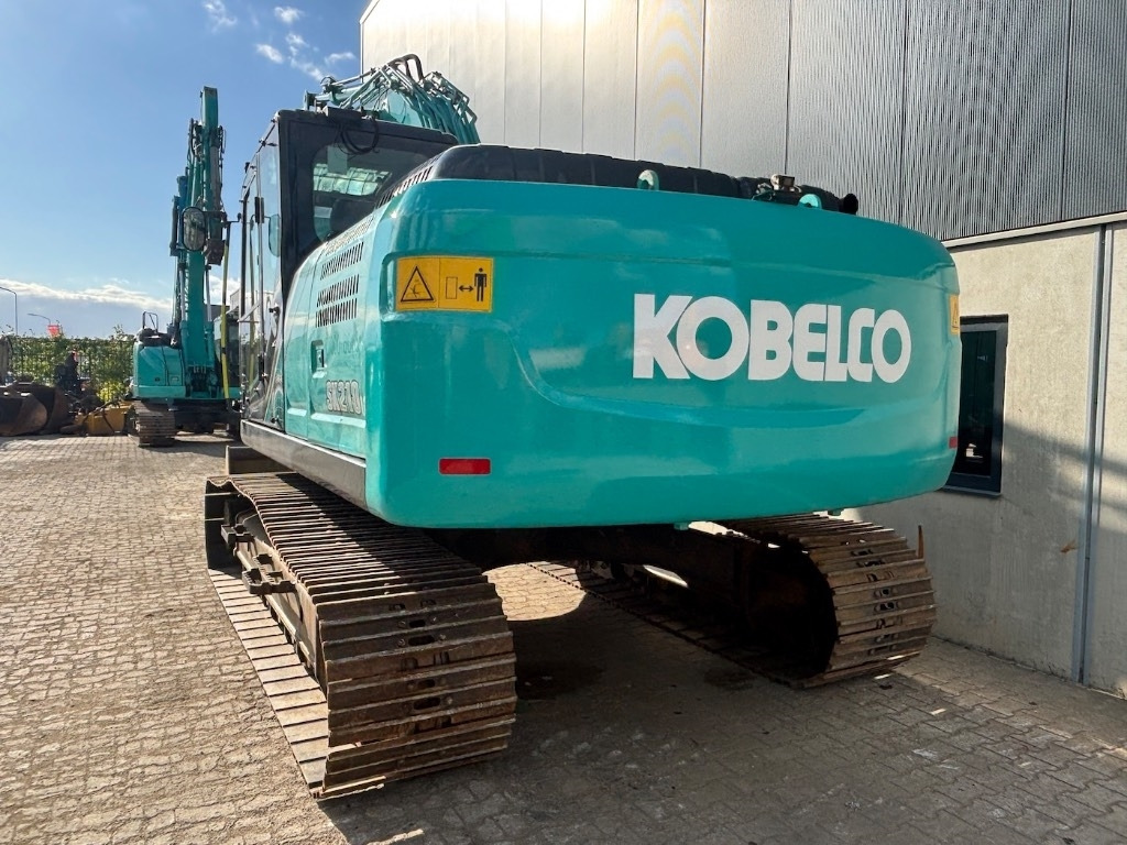 Kobelco SK 210 LC-10 - SK210 - SK210LC-10 - Ekskavator me zinxhirë: foto 4 Kobelco SK 210 LC-10 - SK210 - SK210LC-10 - Ekskavator me zinxhirë: foto 4