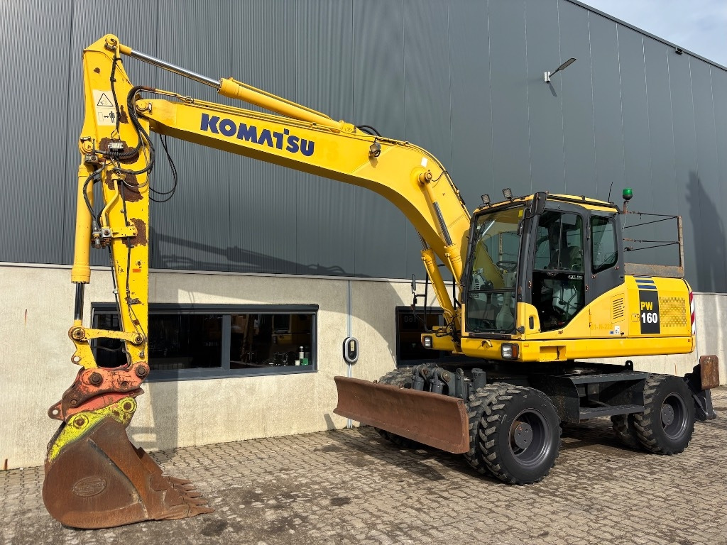 Komatsu PW 160-7 - PW160 - PW 160 - PW 180 - PW 140 - Ekskavator me goma: foto 1 Komatsu PW 160-7 - PW160 - PW 160 - PW 180 - PW 140 - Ekskavator me goma: foto 1