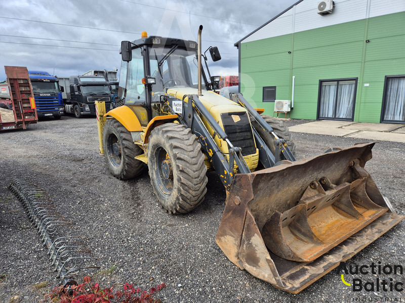 JCB 4 CX - Fadromë me shkarkim nga prapa: foto 2 JCB 4 CX - Fadromë me shkarkim nga prapa: foto 2