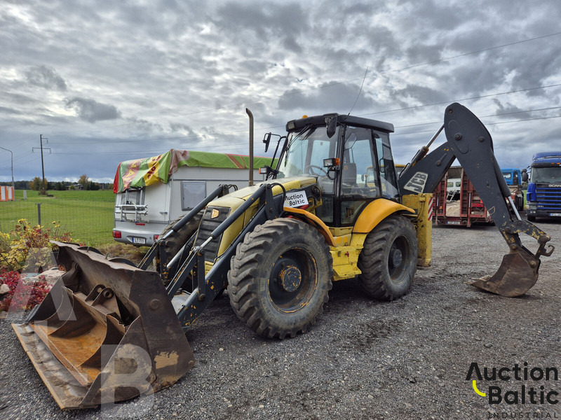 JCB 4 CX - Fadromë me shkarkim nga prapa: foto 1 JCB 4 CX - Fadromë me shkarkim nga prapa: foto 1