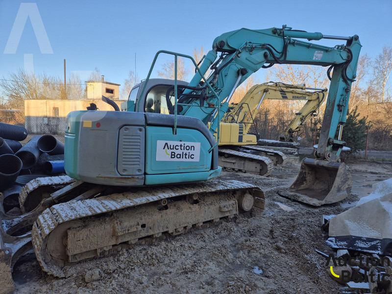 Kobelco SK 135 SR LC-1 E - Ekskavator me zinxhirë: foto 3 Kobelco SK 135 SR LC-1 E - Ekskavator me zinxhirë: foto 3