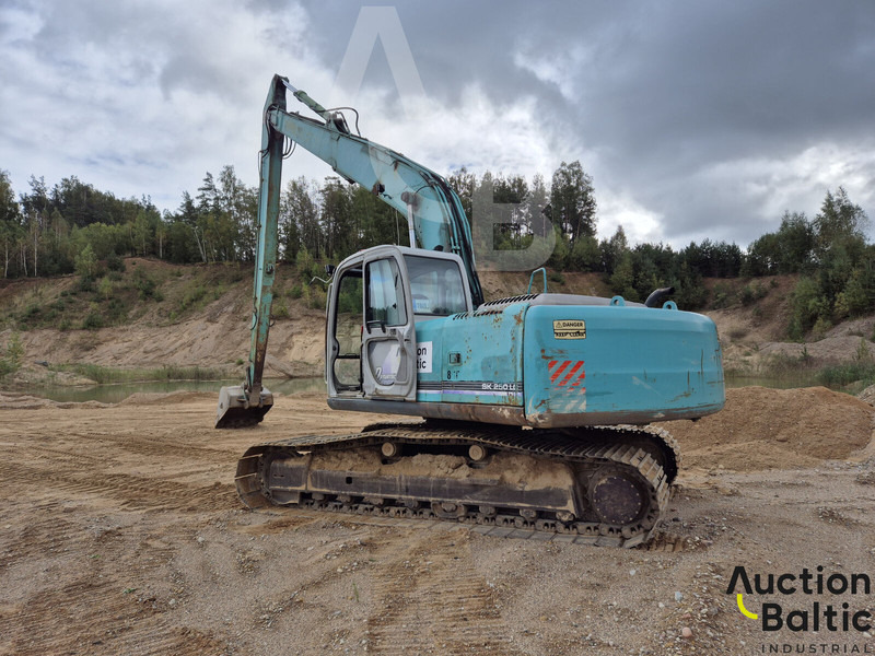 Kobelco SK 250 LC - Ekskavator me zinxhirë: foto 3 Kobelco SK 250 LC - Ekskavator me zinxhirë: foto 3