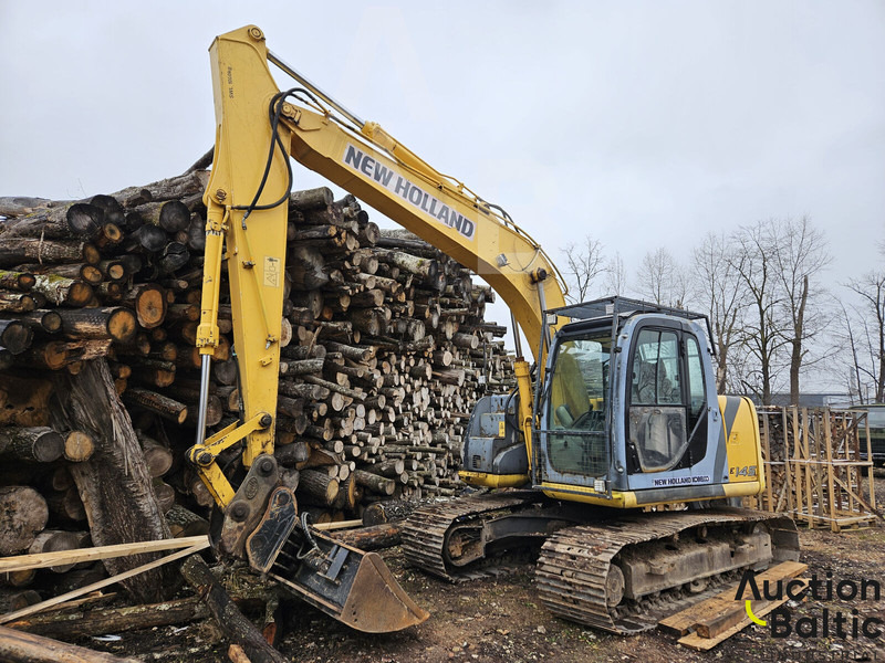 New Holland E 145 - Ekskavator me zinxhirë: foto 1 New Holland E 145 - Ekskavator me zinxhirë: foto 1