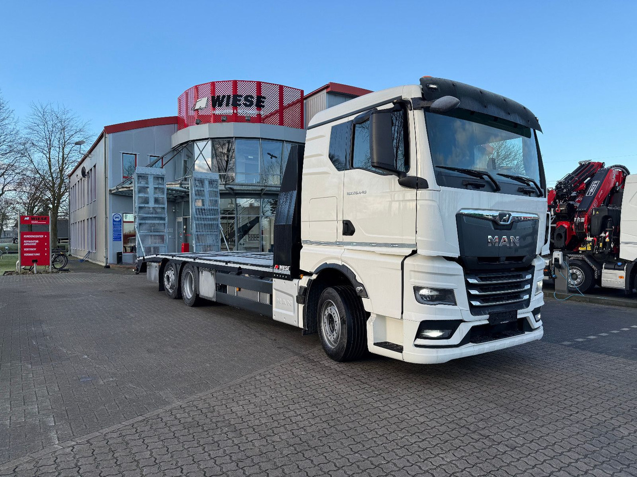 MAN Baumaschinen- Arbeitsbühnentransporter Rampen - Autotransportues: foto 2 MAN Baumaschinen- Arbeitsbühnentransporter Rampen - Autotransportues: foto 2