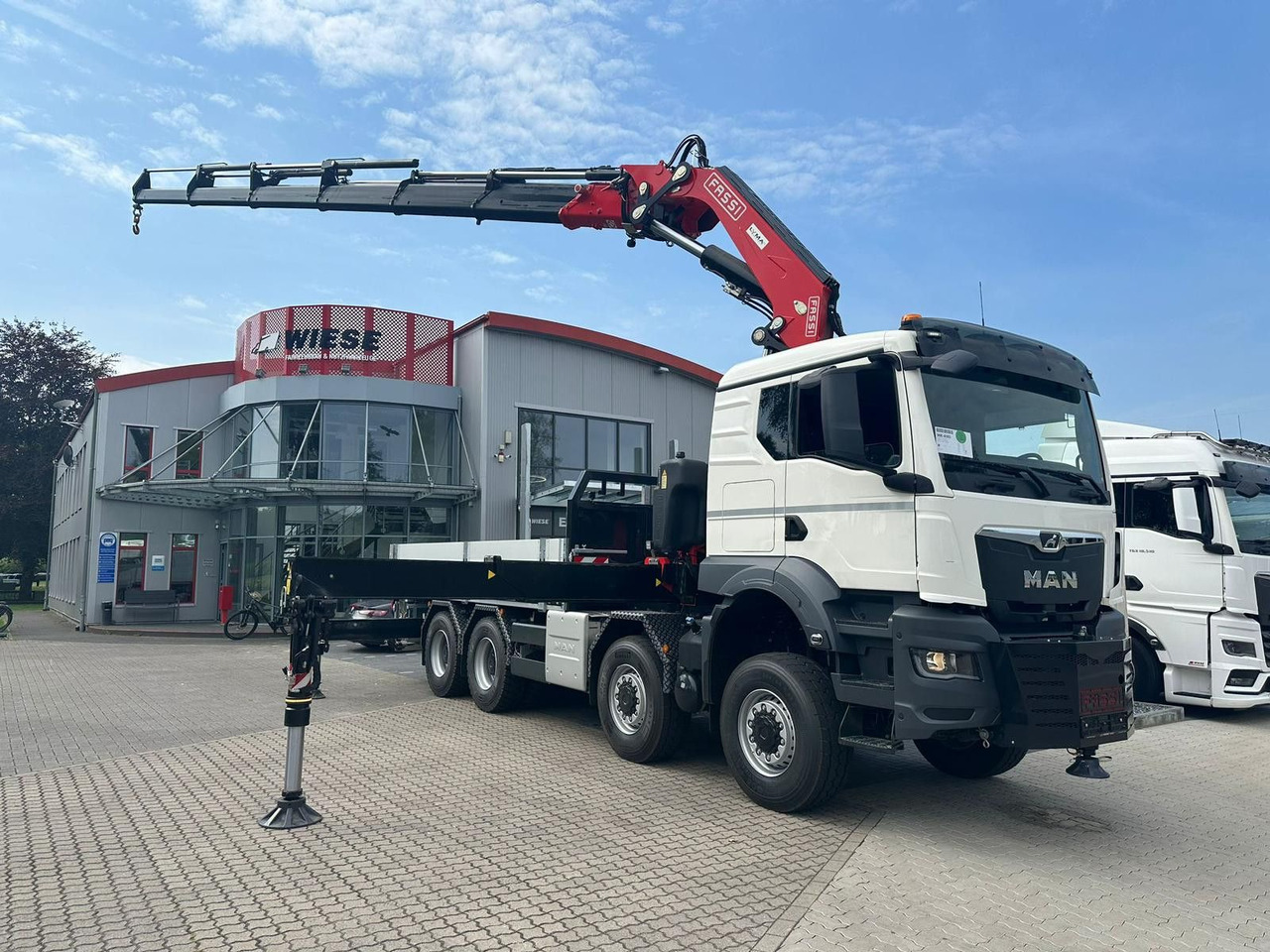 MAN TGS 41.520 8x8 mit Fassi Ladekran F710RA.2.26 - Kamion me karroceri të hapur: foto 1 MAN TGS 41.520 8x8 mit Fassi Ladekran F710RA.2.26 - Kamion me karroceri të hapur: foto 1