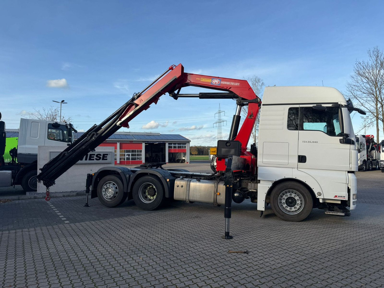 MAN TGX 26.440 6x2 mit HMF 3000-5 Kran Top Zustand - Kamion me vinç: foto 1 MAN TGX 26.440 6x2 mit HMF 3000-5 Kran Top Zustand - Kamion me vinç: foto 1