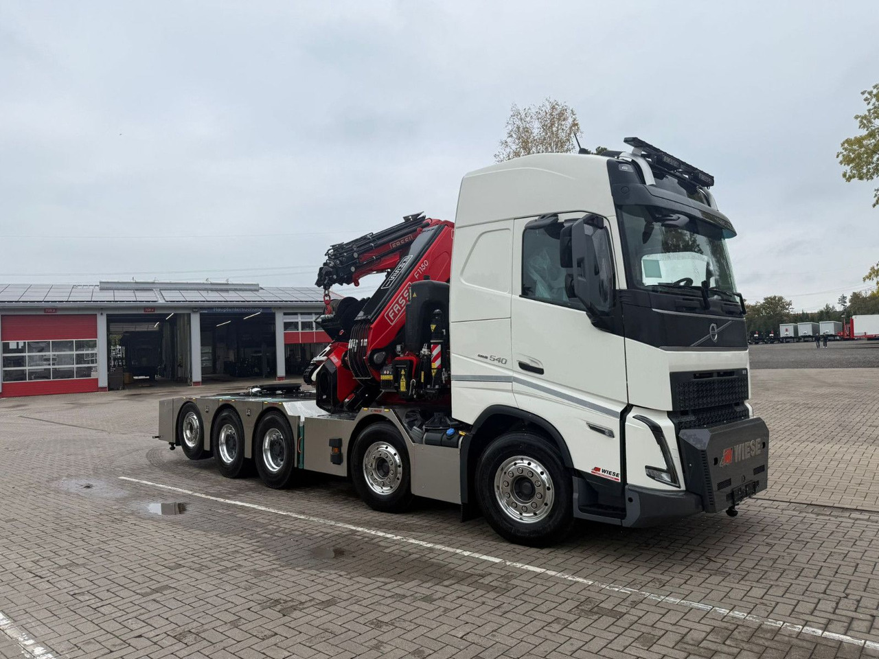 Volvo FH540 10x4 mit F1150 Ladekran, Sattelzugmaschine - Kamion me karroceri të hapur, Kamion me vinç: foto 1 Volvo FH540 10x4 mit F1150 Ladekran, Sattelzugmaschine - Kamion me karroceri të hapur, Kamion me vinç: foto 1