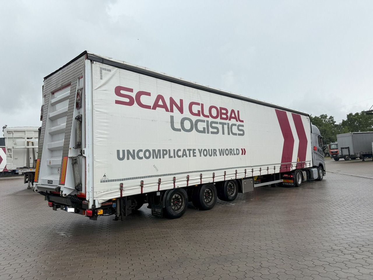 Wiese Mega Schiebeplane mit Dhollandia Rampe 9t - Gjysmë rimorkio me tendë: foto 2 Wiese Mega Schiebeplane mit Dhollandia Rampe 9t - Gjysmë rimorkio me tendë: foto 2