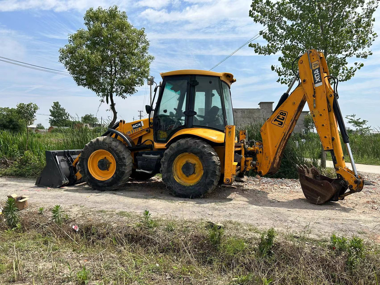 JCB 4CX - Fadromë me shkarkim nga prapa: foto 4 JCB 4CX - Fadromë me shkarkim nga prapa: foto 4