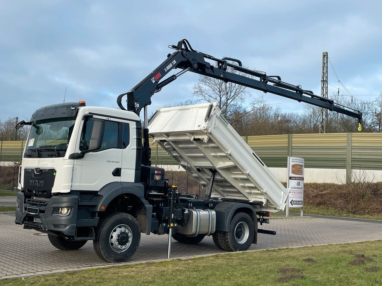 MAN TGS 18.400 TG3 4x4 Euro6e Hiab X-HiDuo 138DS-4 - Kamion vetëshkarkues, Kamion me vinç: foto 1 MAN TGS 18.400 TG3 4x4 Euro6e Hiab X-HiDuo 138DS-4 - Kamion vetëshkarkues, Kamion me vinç: foto 1