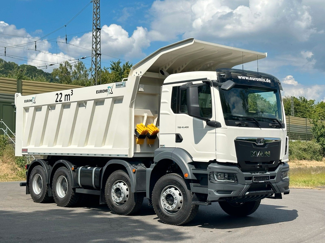 MAN TGS 41.440 8x4 EuromixMTP 22m³ Eckige Mulde - Kamion vetëshkarkues: foto 1 MAN TGS 41.440 8x4 EuromixMTP 22m³ Eckige Mulde - Kamion vetëshkarkues: foto 1
