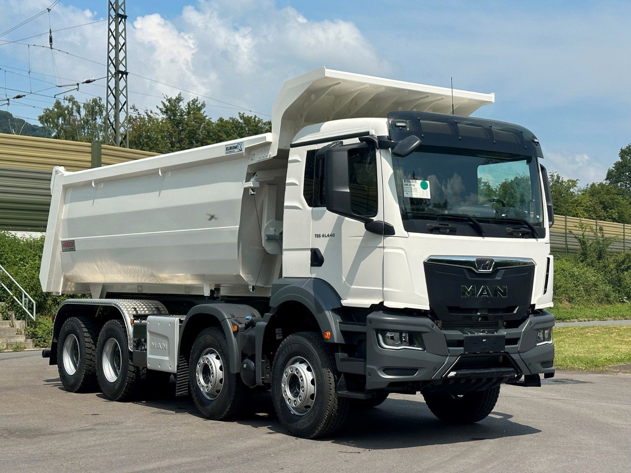 MAN TGS 41.440 8x4 EuromixMTP Mulden-Kipper - Kamion vetëshkarkues: foto 1 MAN TGS 41.440 8x4 EuromixMTP Mulden-Kipper - Kamion vetëshkarkues: foto 1