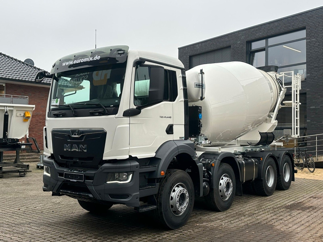 MAN TGS 41.480 8x4 WECHSELSYSTEM KIPPER+MISCHER - Kamion vetëshkarkues: foto 3 MAN TGS 41.480 8x4 WECHSELSYSTEM KIPPER+MISCHER - Kamion vetëshkarkues: foto 3