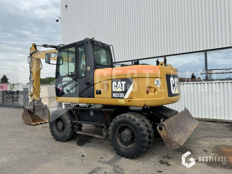 Caterpillar M313D - Ekskavator me goma: foto 2 Caterpillar M313D - Ekskavator me goma: foto 2