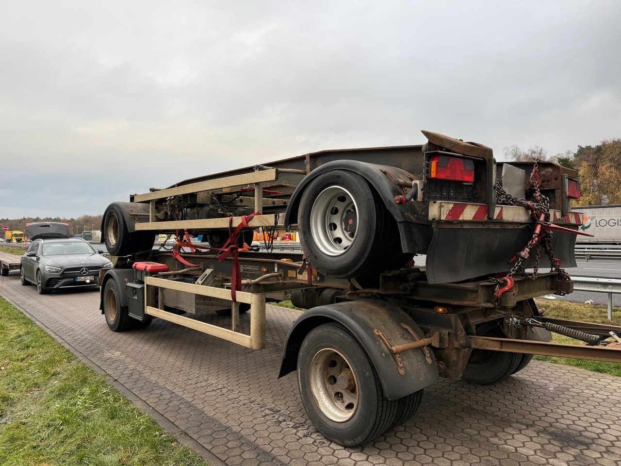 Hüffermann HSA 18.70 Schlittenabroller Containeranhänger 2x - Rimorkio roll-off/ Skip loader: foto 1 Hüffermann HSA 18.70 Schlittenabroller Containeranhänger 2x - Rimorkio roll-off/ Skip loader: foto 1