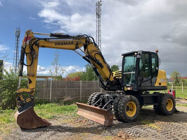 Yanmar B110W - Ekskavator me goma: foto 1 Yanmar B110W - Ekskavator me goma: foto 1