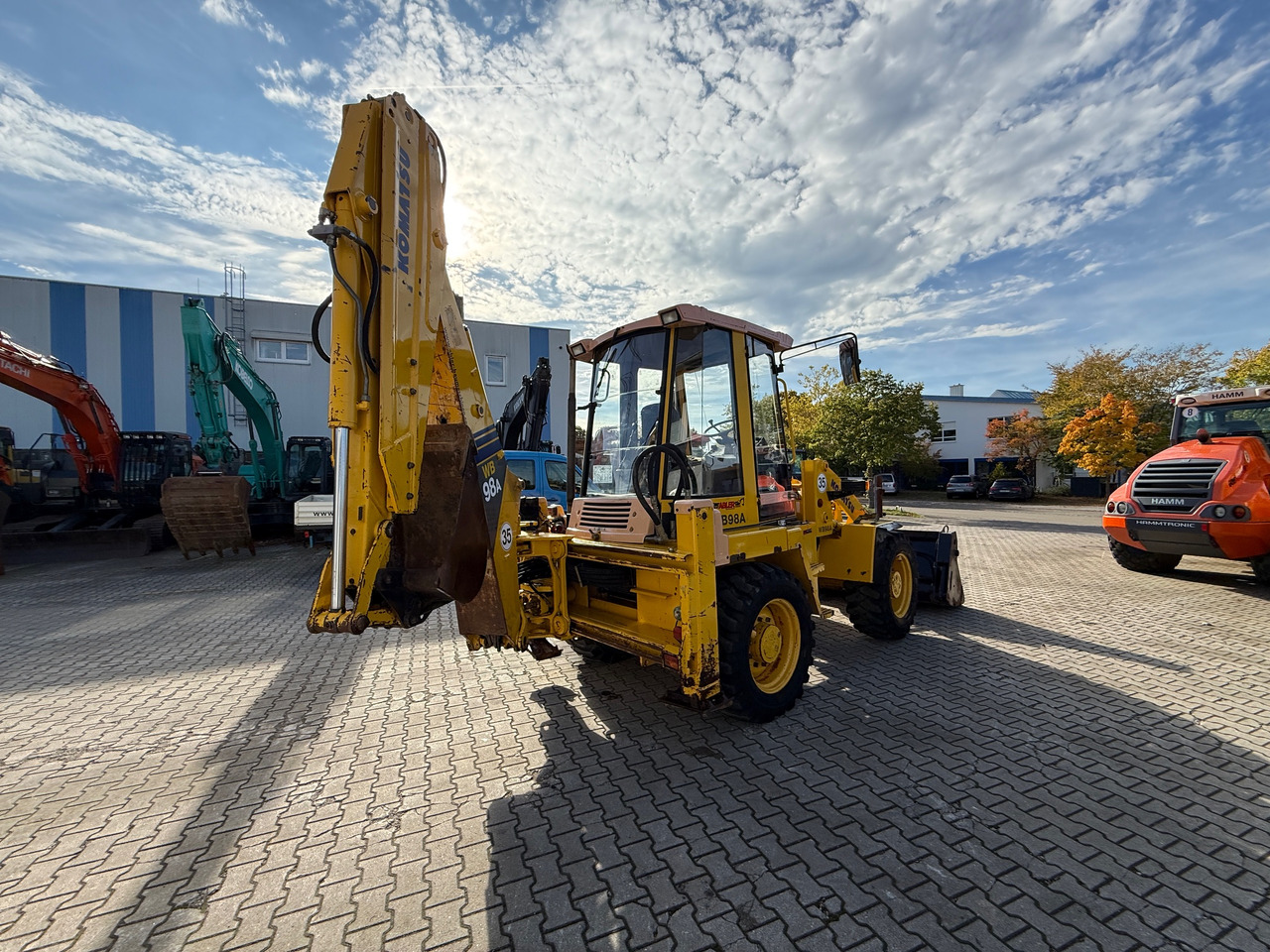 Komatsu WB98A-2 Baggerlader SW - Fadromë me shkarkim nga prapa: foto 5 Komatsu WB98A-2 Baggerlader SW - Fadromë me shkarkim nga prapa: foto 5