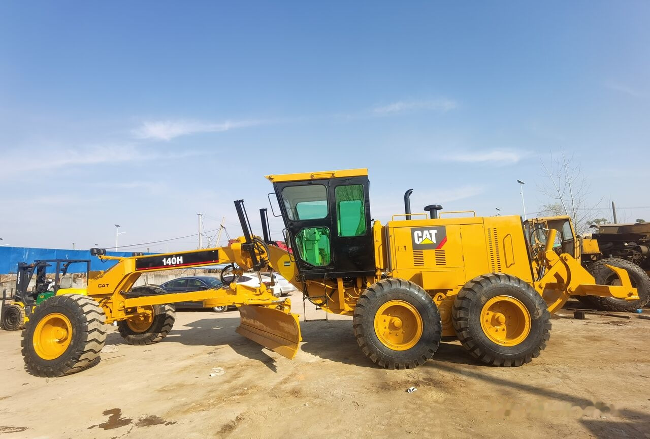 Caterpillar 140H - Makinë niveluese: foto 1 Caterpillar 140H - Makinë niveluese: foto 1