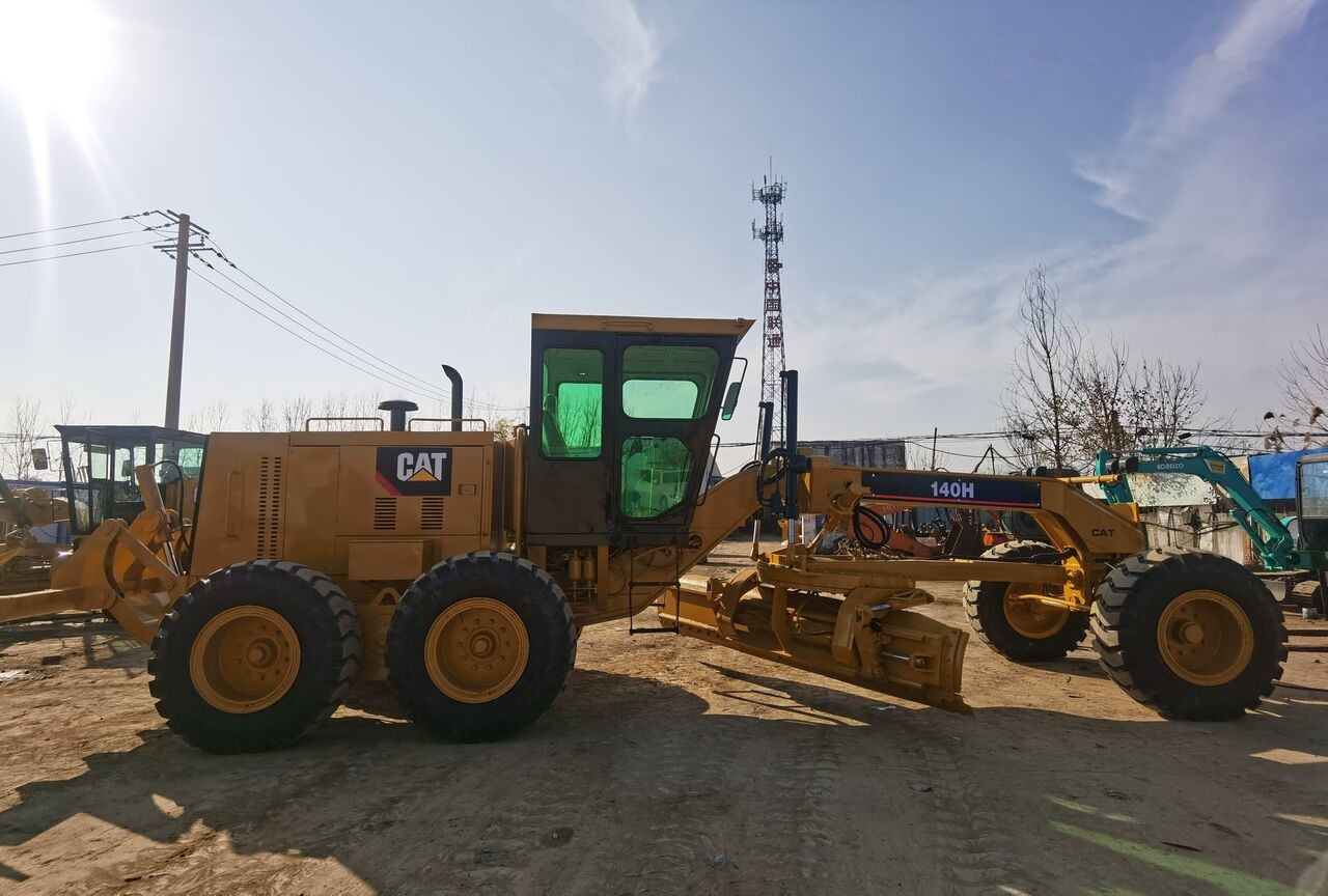Caterpillar 140H - Makinë niveluese: foto 2 Caterpillar 140H - Makinë niveluese: foto 2