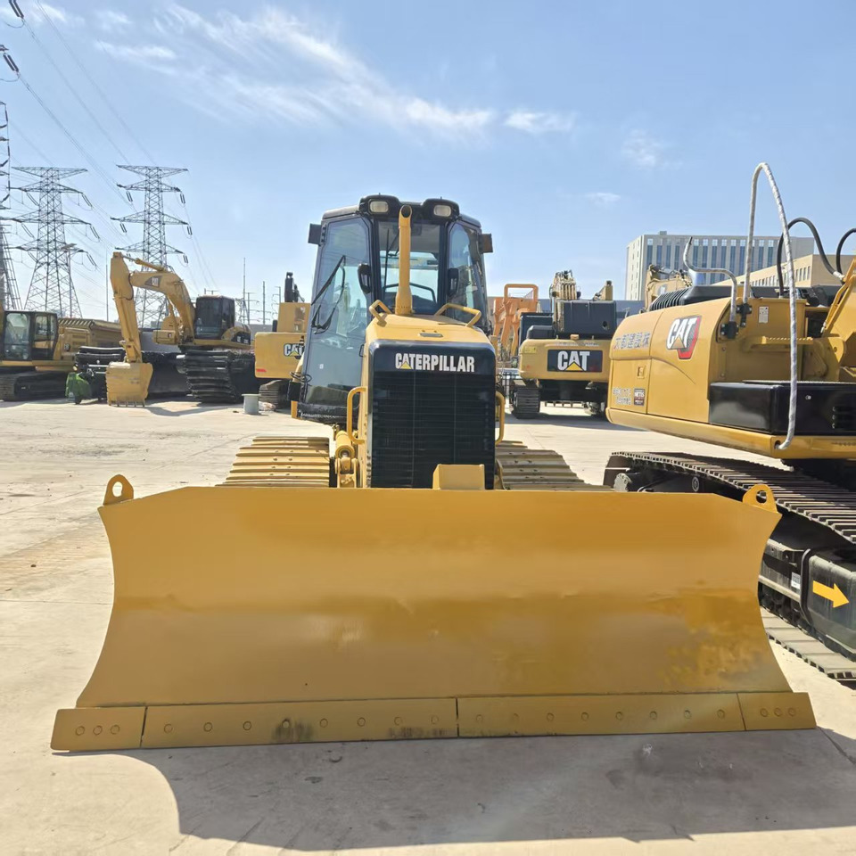 Caterpillar D5K - Ekskavator me zinxhirë: foto 5 Caterpillar D5K - Ekskavator me zinxhirë: foto 5