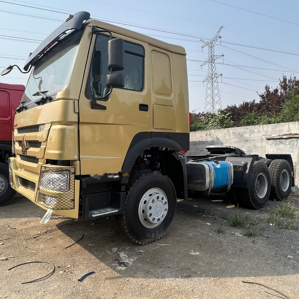 Sinotruk HOWO 420 Tractor - Gjysmë-kamion: foto 1 Sinotruk HOWO 420 Tractor - Gjysmë-kamion: foto 1