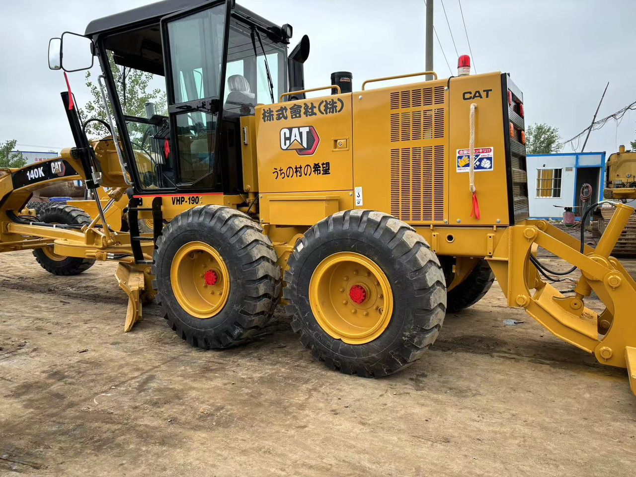 Caterpillar 140K - Makinë niveluese: foto 4 Caterpillar 140K - Makinë niveluese: foto 4