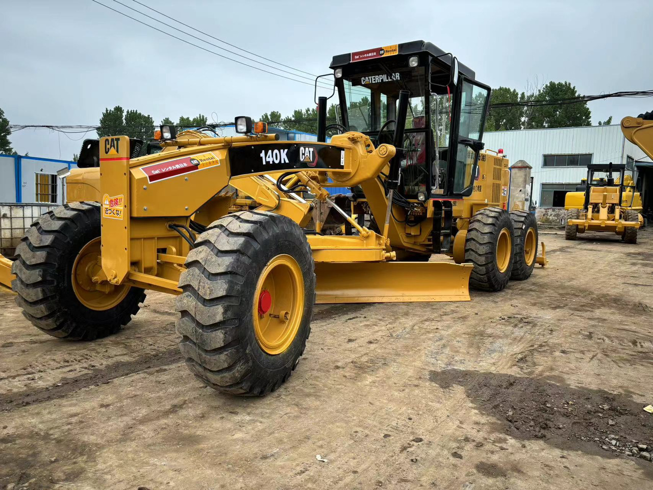 Caterpillar 140K - Makinë niveluese: foto 2 Caterpillar 140K - Makinë niveluese: foto 2