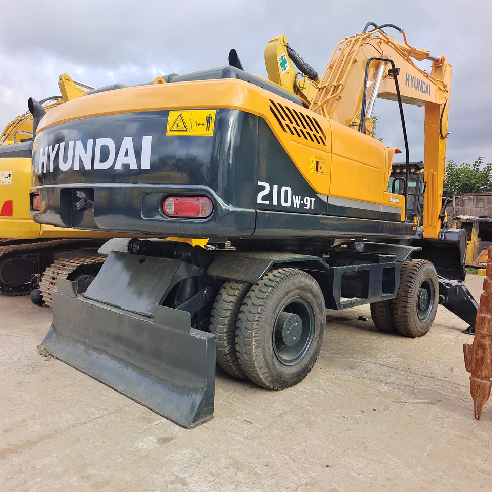 HYUNDAI 210w-9t ROBEX 210W - 9T 210W-9S - Ekskavator me goma: foto 2 HYUNDAI 210w-9t ROBEX 210W - 9T 210W-9S - Ekskavator me goma: foto 2