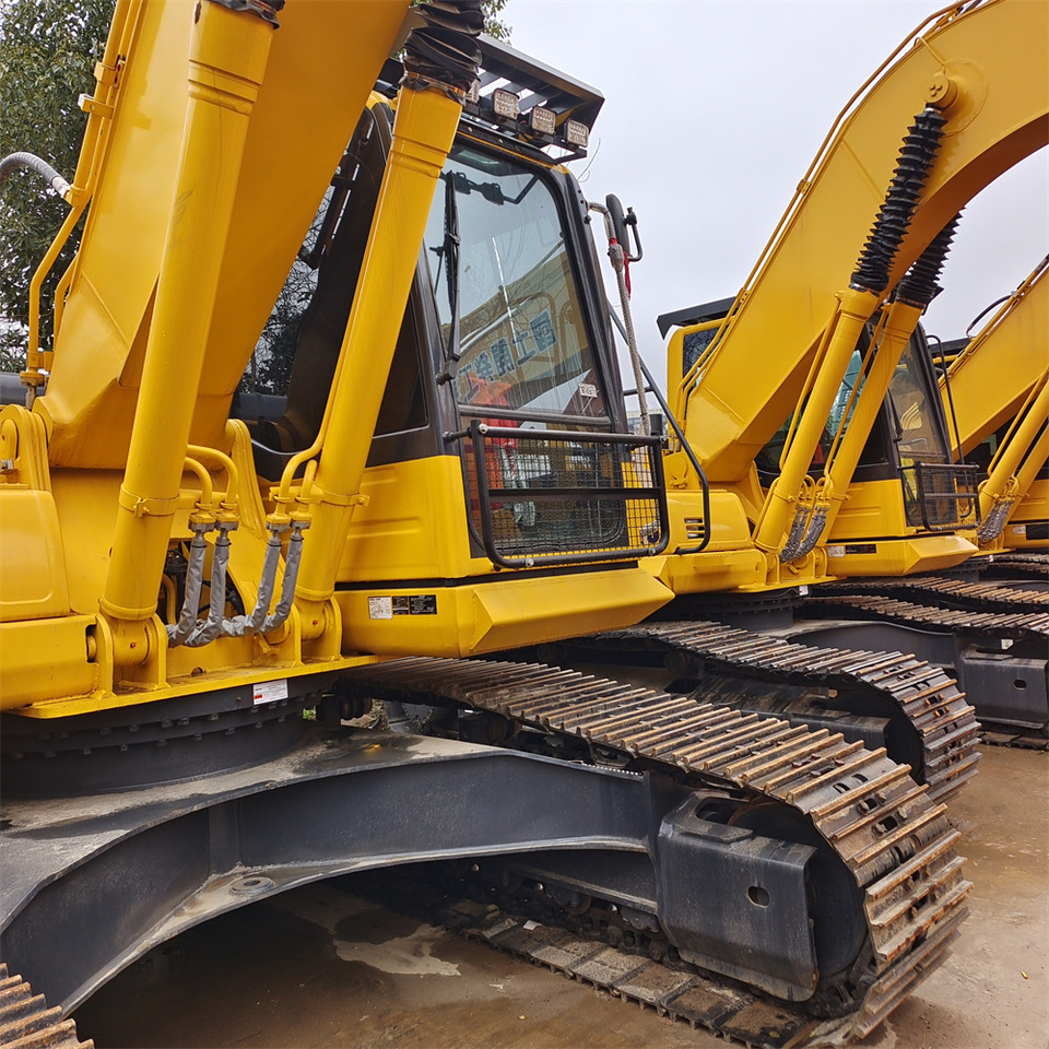KOMATSU PC 210LC - 8 - Ekskavator me zinxhirë: foto 4 KOMATSU PC 210LC - 8 - Ekskavator me zinxhirë: foto 4