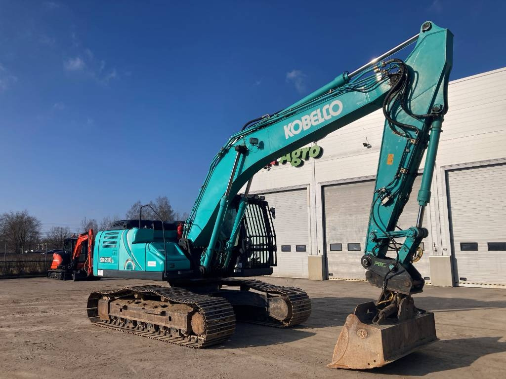Kobelco SK 210 LC-10 - Ekskavator me zinxhirë: foto 4 Kobelco SK 210 LC-10 - Ekskavator me zinxhirë: foto 4
