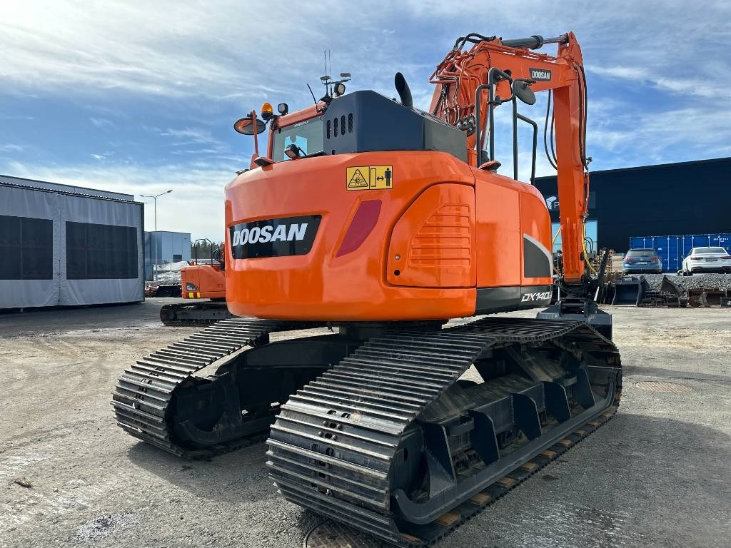 Doosan DX 140 LCR-5 metsäalusta - Ekskavator me zinxhirë: foto 4 Doosan DX 140 LCR-5 metsäalusta - Ekskavator me zinxhirë: foto 4