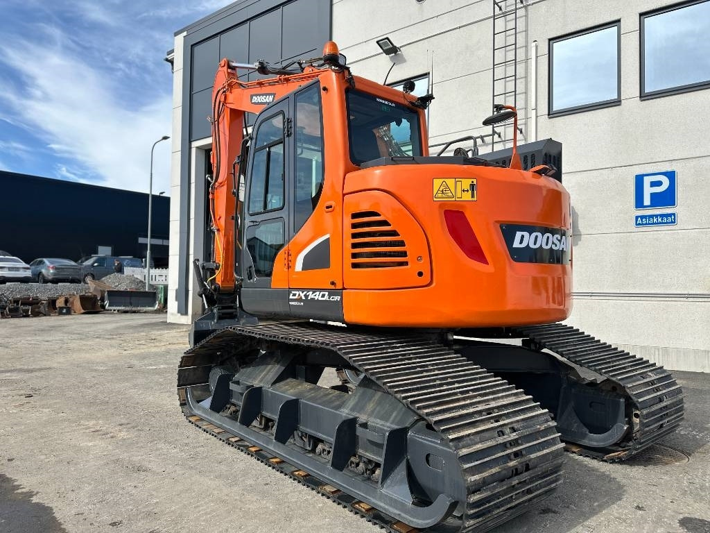 Doosan DX 140 LCR-5 metsäalusta - Ekskavator me zinxhirë: foto 2 Doosan DX 140 LCR-5 metsäalusta - Ekskavator me zinxhirë: foto 2