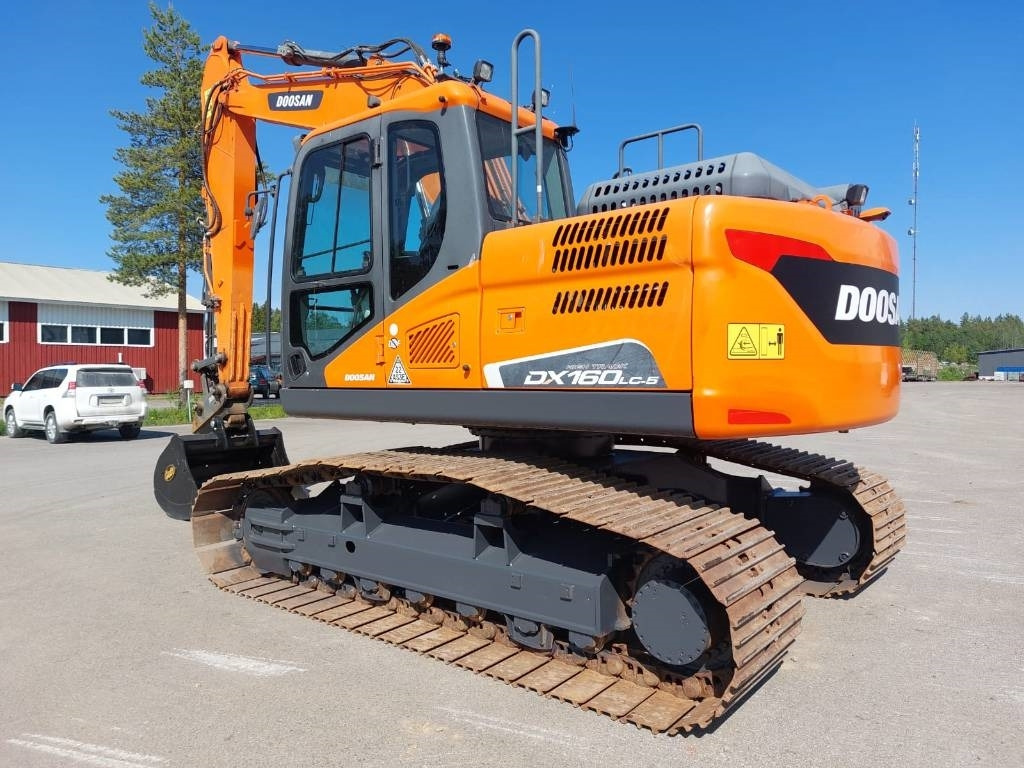 Doosan DX160LCH-5 METSÄALUSTA - Ekskavator me zinxhirë: foto 2 Doosan DX160LCH-5 METSÄALUSTA - Ekskavator me zinxhirë: foto 2