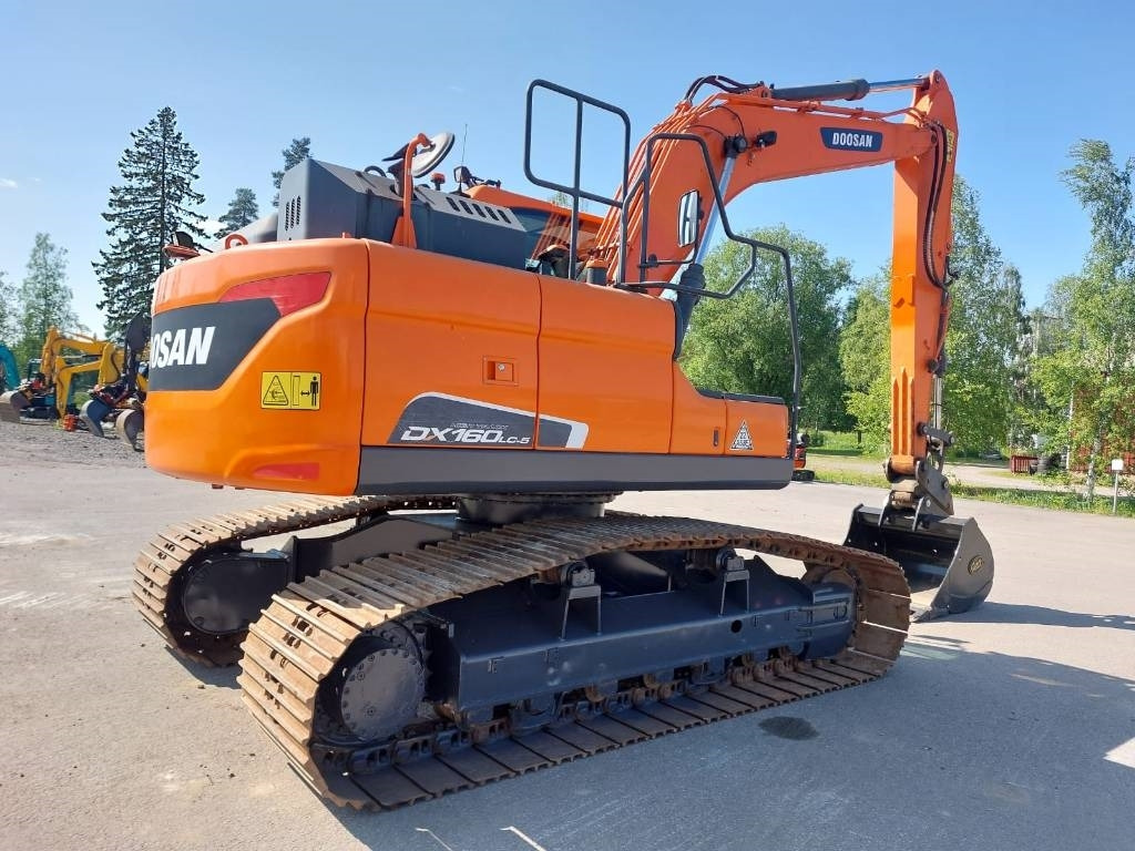 Doosan DX160LCH-5 METSÄALUSTA - Ekskavator me zinxhirë: foto 4 Doosan DX160LCH-5 METSÄALUSTA - Ekskavator me zinxhirë: foto 4