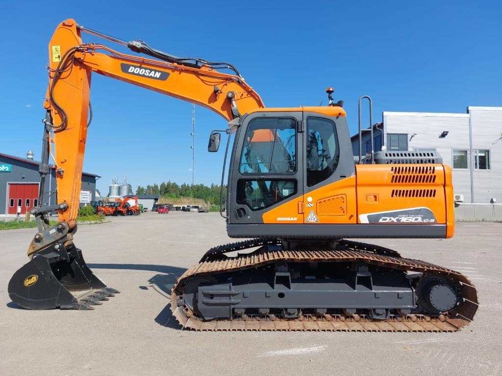 Doosan DX160LCH-5 METSÄALUSTA - Ekskavator me zinxhirë: foto 1 Doosan DX160LCH-5 METSÄALUSTA - Ekskavator me zinxhirë: foto 1
