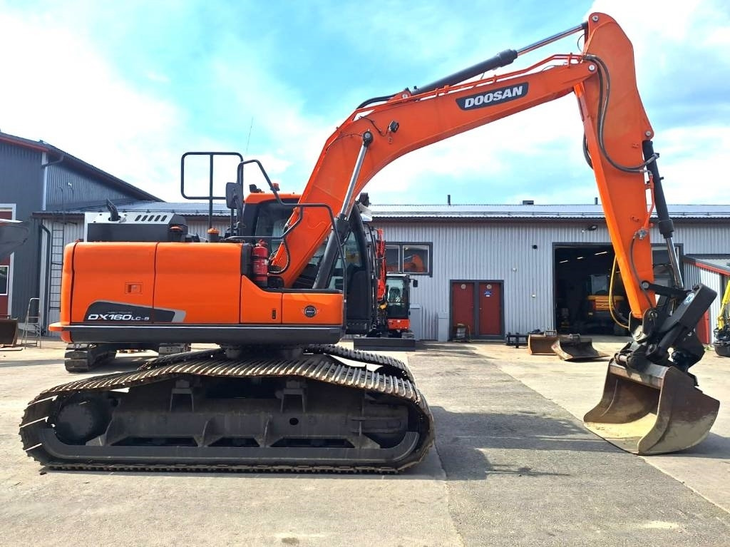 Doosan DX160LCH-5 METSÄMALLI KALLISTAJALLA - Ekskavator me zinxhirë: foto 5 Doosan DX160LCH-5 METSÄMALLI KALLISTAJALLA - Ekskavator me zinxhirë: foto 5