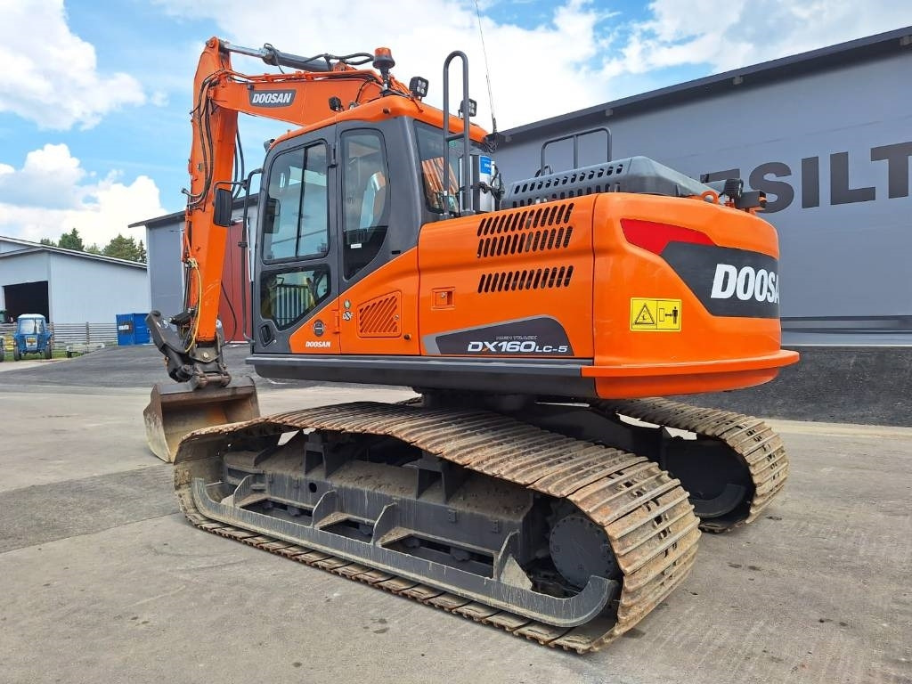Doosan DX160LCH-5 METSÄMALLI KALLISTAJALLA - Ekskavator me zinxhirë: foto 2 Doosan DX160LCH-5 METSÄMALLI KALLISTAJALLA - Ekskavator me zinxhirë: foto 2