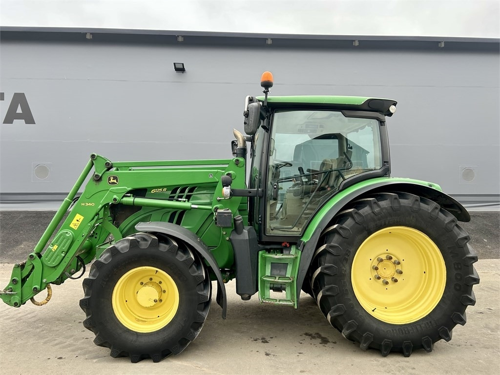 John Deere 6125 R AUTOPOWER ETUKUORMAAJALLA - Traktor: foto 1 John Deere 6125 R AUTOPOWER ETUKUORMAAJALLA - Traktor: foto 1