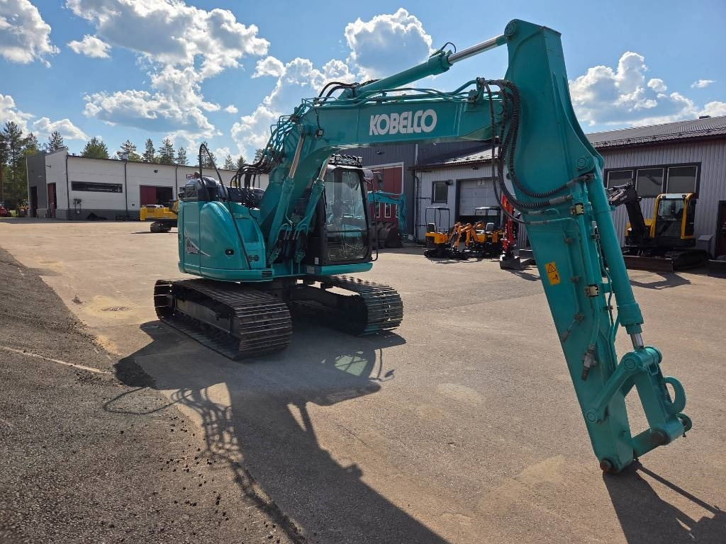 Kobelco SK140SRLC-5 - Ekskavator me zinxhirë: foto 4 Kobelco SK140SRLC-5 - Ekskavator me zinxhirë: foto 4