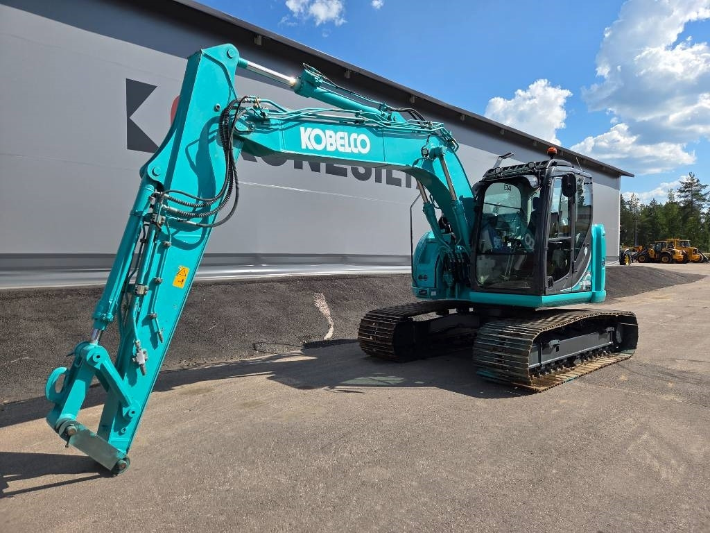Kobelco SK140SRLC-5 - Ekskavator me zinxhirë: foto 5 Kobelco SK140SRLC-5 - Ekskavator me zinxhirë: foto 5